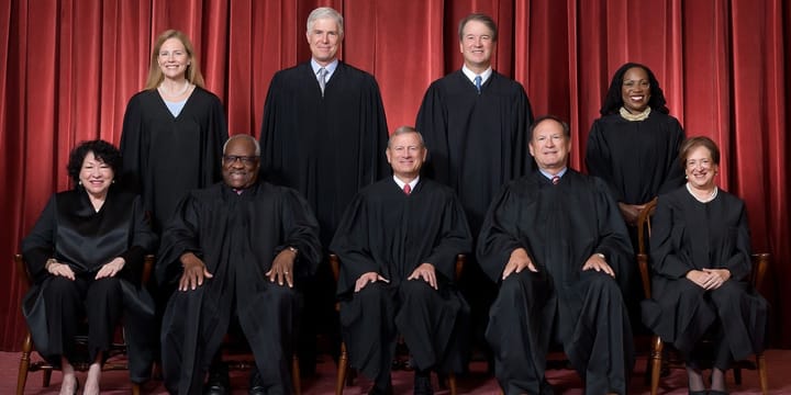 Formal group photograph of the Supreme Court. From left: Justices Sotomayor, Barrett, Thomas, Gorsuch, Roberts, Cavanagh, Alito, Jackson, and Kagan.