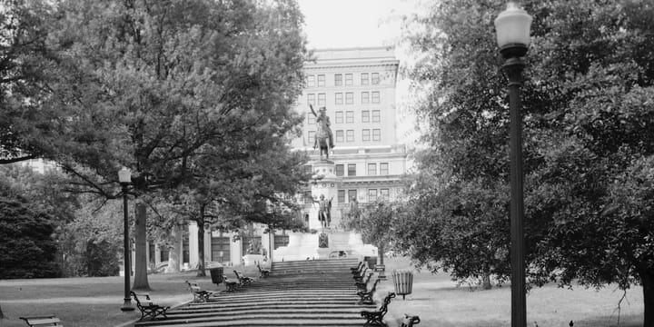 NORTHEAST FACADE AND PERSPECTIVE OF HUNTER HOLMES MCGUIRE STATUE, LOOKING WEST - Virginia State Capitol, Bank and 10th Streets, Capitol Square, Richmond, Independent City, VA